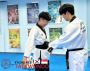 The color of the belt indicates the skill level of a TKD kid