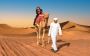Desert Camel Trekking in Dubai- RAEID Experiences