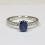 Top Oval Cut Blue Sapphire Prong Set Ring With Round Diamond