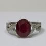 Oval Cut Ruby Prong Set Ring With Round Diamonds