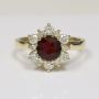 Halo Engagement Ring with Round Cut Ruby and Diamonds