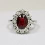Best Oval Cut Ruby Prong Set Halo Ring With Round Diamonds