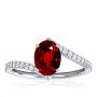 Classic Oval Ruby Ring with Sparkling Diamond Accents (1.26c