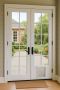 Modern Lifestyle Choice: French Doors With Doggie Doors