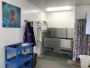 Install vinyl wall covering for dog kennels from Duramax
