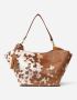 What Makes the Cowhide Tassel Purse a Western Fashion