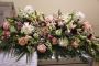 Flowers for a casket from Susan Avery