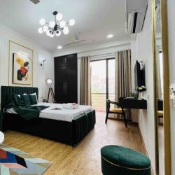 Serviced Apartments in Noida – Premium Stays by Adopremium