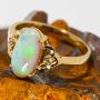 A GOLDEN TEARDROP 14KT YELLOW GOLD & DIAMOND AUSTRALIAN WHIT