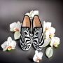 Buy BLACK EYE SLIPONS online in India