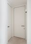 The Sleek Aesthetic of a Door Without a Frame