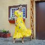 Cotton yellow flared dress with peacock thread embroidery