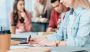 What are the key components of an assignment desk system?