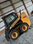 2011 New Holland L215 Wheeled Skid Steer Loader
