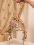 Elegant Bridal Potli Bags for Wedding by Needledust