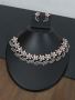Elegant Silver Necklace with Intricate Flower Design