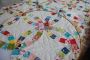 Stitched Memories - Custom Photo Quilts for Families