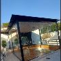 Modern Living Redefined with Elegant Glass House Design