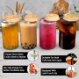 Drinking glasses with bamboo lids and straws