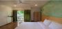 Luxury Awaits: Deluxe Room with Balcony at Turtle Maldives